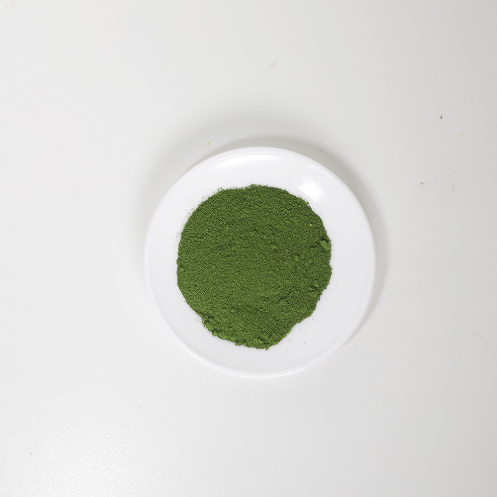 Top view of Baby Spinach Sprinkles and powder meal topper for dogs and dog treat ideas