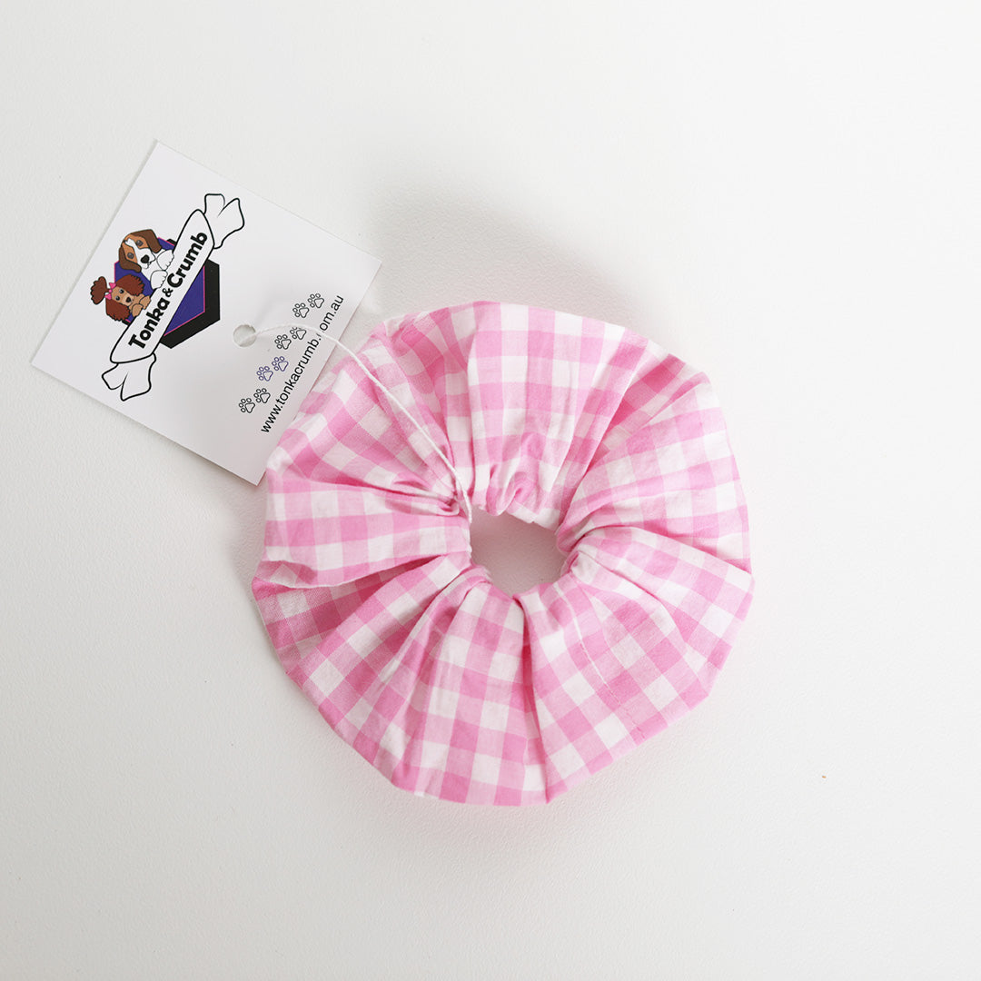 Front view of pink gingham scrunchie