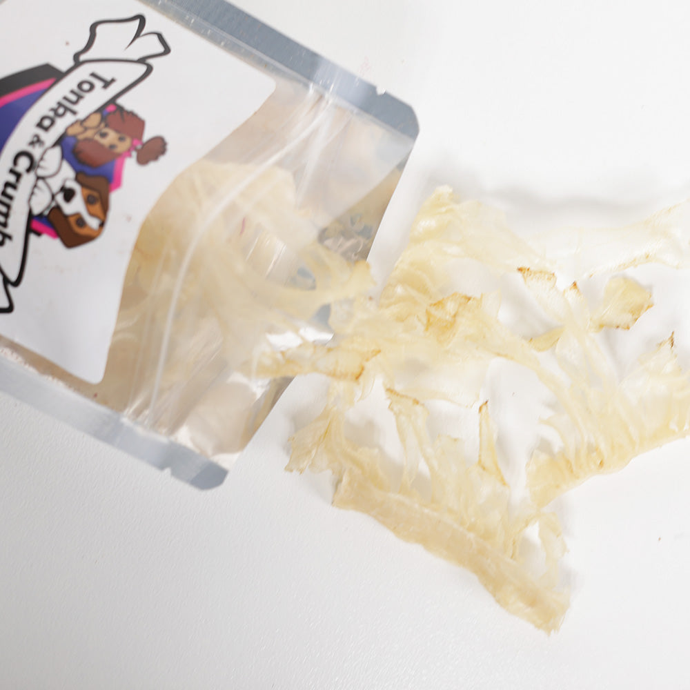 Tripe dog treats pictured with packaging