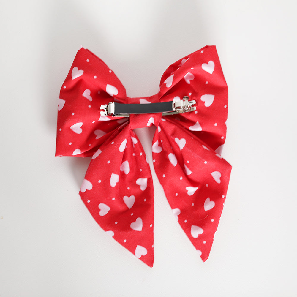 Red valentines bow back view with barrette clip