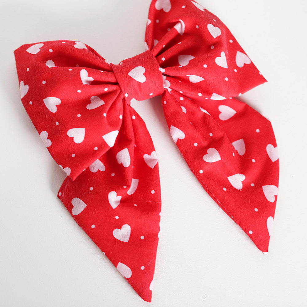 Red valentines hair bow side view