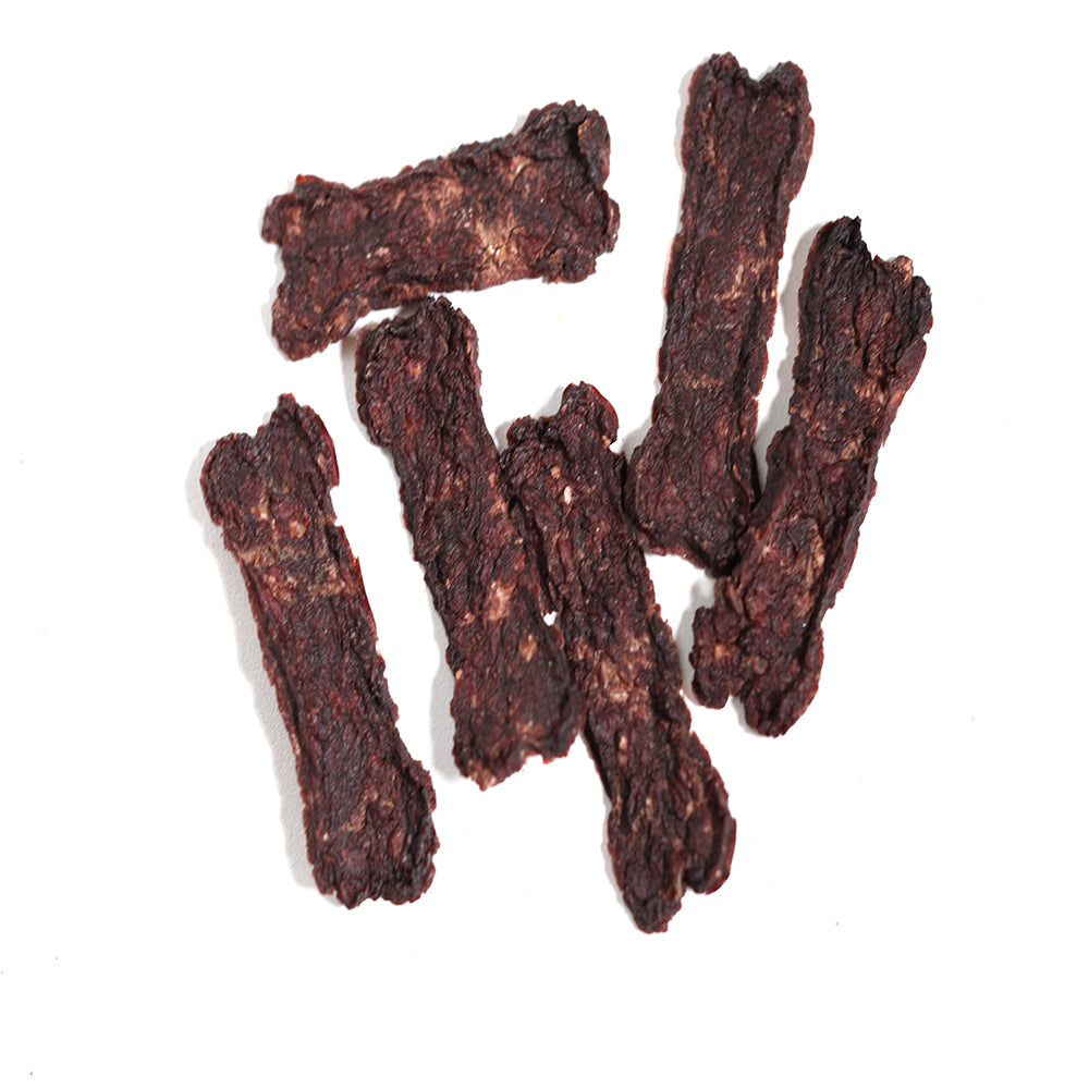 Top view Kangaroo Jerky dog treats and meal topper